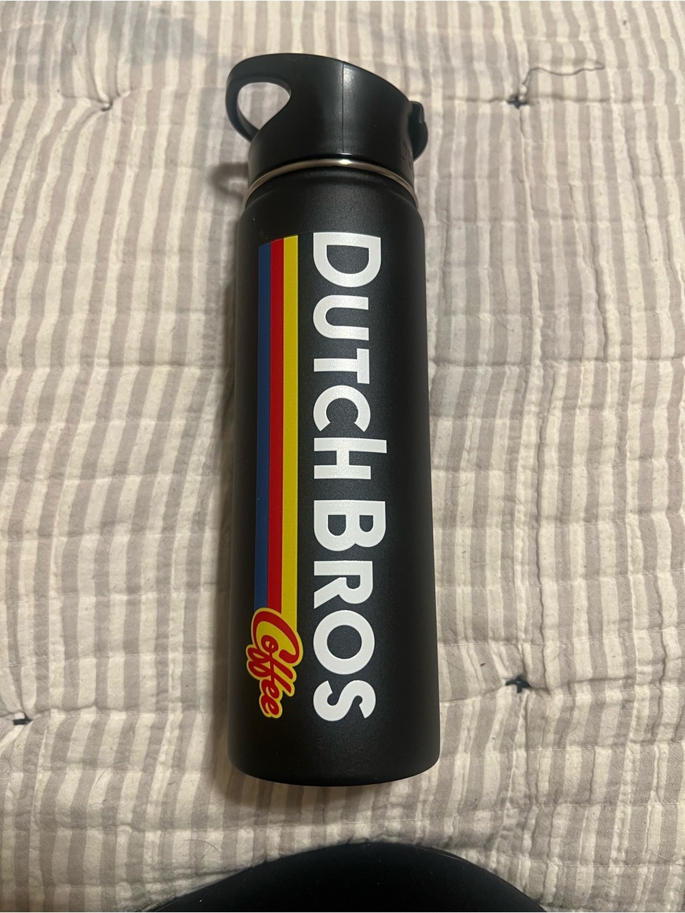 Dutch Bros Black Bottle with Red, Yellow & Blue Stripe